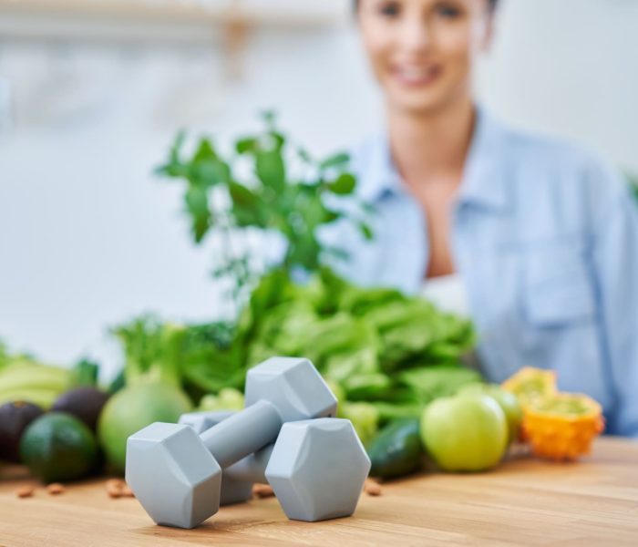 healthy-adult-woman-with-green-food-in-the-kitchen-2025-01-08-17-25-44-utc